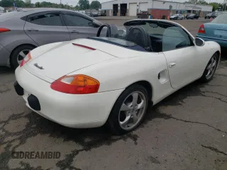 2001 Porsche Boxster z VIN WP0CA29821U622592, wystawiony jako Copart lot #56050735 z przebiegiem Nie podano mil oraz Szkoda całkowita • Salvage title. Historia ofert i sprzedaży dostępna na DreamBid. Obrazek 3.