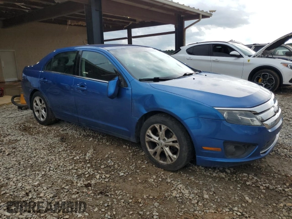 2012 Ford Fusion SE with VIN 3FAHP0HA7CR242547, listed as a Copart auction lot 60599355 with 190,209 mi miles and Salvage title. Bid and sale history available at DreamBid. Image 4.