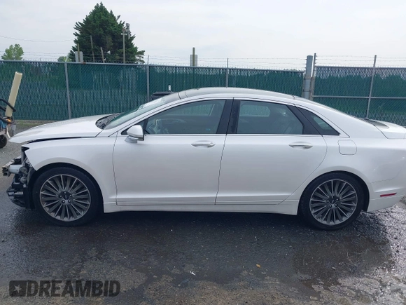 2015 Lincoln MKZ с VIN 3LN6L2G92FR605921, выставлен на аукционе IAAI как лот 42470145 с пробегом 174 569 миль миль и . История ставок и продаж доступна на DreamBid. Изображение 14.