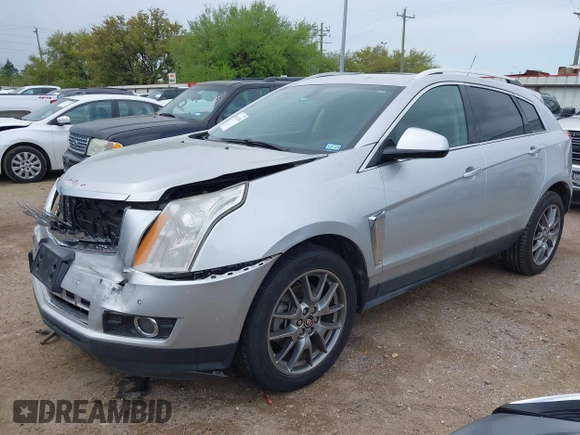 2015 Cadillac SRX Performance Collection z VIN 3GYFNCE36FS633386, wystawiony jako IAAI lot #41851338 z przebiegiem 102 586 mil mil oraz . Historia ofert i sprzedaży dostępna na DreamBid. Obrazek 2.