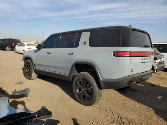2023 Rivian R1S Adventure with VIN 7PDSGABA0PN022442, listed as a Copart auction lot 72570564 with 8,648 mi miles and Salvage Title. Bid and sale history available at carsss.com. Image 2.