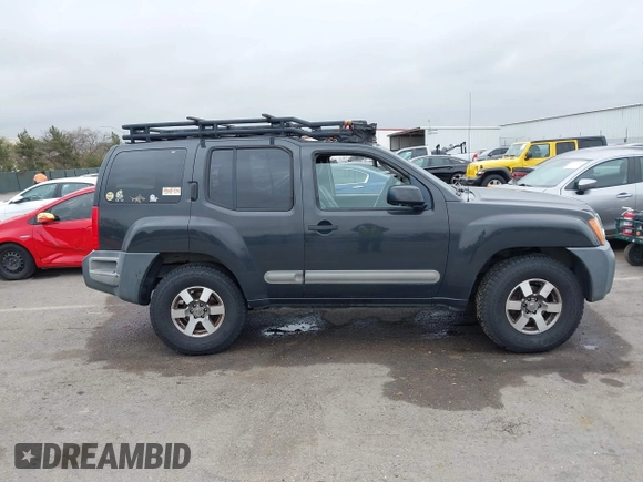 2012 Nissan Xterra S with VIN 5N1AN0NW4CC523071, listed as a IAAI auction lot 41874263 with 154,556 mi miles and . Bid and sale history available at DreamBid. Image 14.