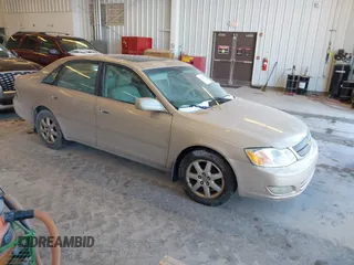 2002 Toyota Avalon XL with VIN 4T1BF28B32U255693, listed as a IAAI auction lot 41629186 with 221,335 mi miles. Bid and sale history available at carsss.com. Image 1.