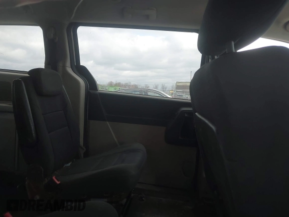 2010 Dodge Grand Caravan SXT with VIN 2D4RN5D13AR180609, listed as a IAAI auction lot 41857215 with Not Provided miles and . Bid and sale history available at DreamBid. Image 8.
