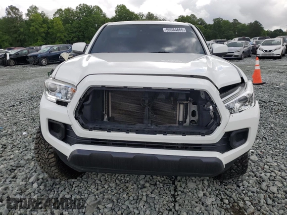 2021 Toyota Tacoma SR с VIN 3TMCZ5AN4MM386662, выставлен на аукционе Copart как лот 56954865 с пробегом 70 623 миль миль и Списание • Salvage title. История ставок и продаж доступна на DreamBid. Изображение 5.