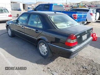 2000 Mercedes-Benz C 230 Kompressor with VIN WDBHA24G4YA830830, listed as a IAAI auction lot 41242224 with 256,011 mi miles and . Bid and sale history available at carsss.com. Image 3.