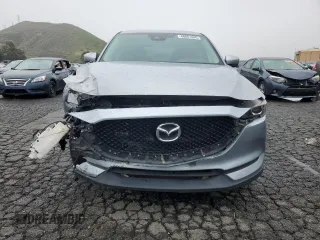 2017 Mazda CX-5 Touring with VIN JM3KFACL9H0183937, listed as a Copart auction lot 48861865 with 91,268 mi miles and Salvage Title. Bid and sale history available at carsss.com. Image 5.