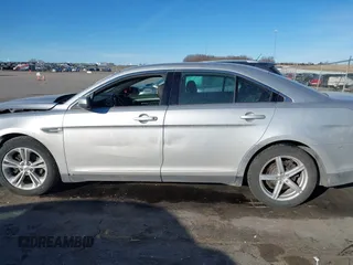 2013 Ford Taurus SEL with VIN 1FAHP2E83DG224780, listed as a IAAI auction lot 41675601 with 166,977 mi miles. Bid and sale history available at carsss.com. Image 14.
