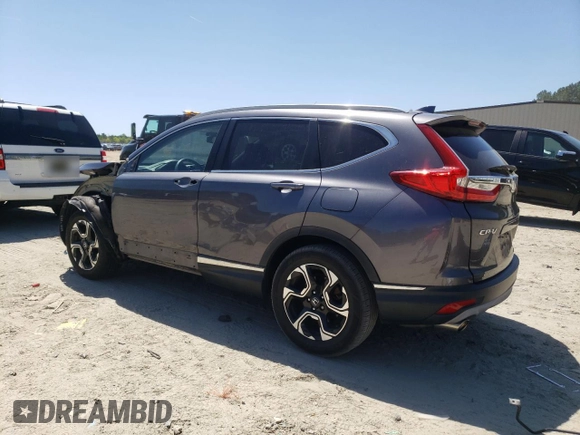 2017 Honda CR-V Touring with VIN 2HKRW2H96HH612495, listed as a Copart auction lot 54195655 with 66,968 mi miles and Salvage Title. Bid and sale history available at DreamBid. Image 2.