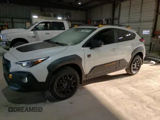 2024 Subaru Crosstrek Wilderness с VIN 4S4GUHU60R3822935, выставлен на аукционе Copart как лот 51966575 с пробегом 3 736 миль миль и Списание • Salvage title. История ставок и продаж доступна на DreamBid. Изображение 1.