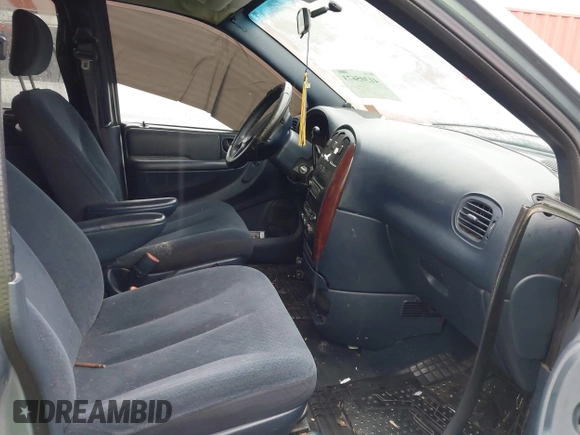2003 Chrysler Town & Country LX with VIN 2C4GP44L53R209654, listed as a IAAI auction lot 41305673 with 258,070 mi miles and . Bid and sale history available at DreamBid. Image 5.