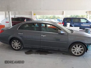 2009 Toyota Avalon XL with VIN 4T1BK36B19U348758, listed as a IAAI auction lot 39746698 with 141,454 mi miles and . Bid and sale history available at DreamBid. Image 12.