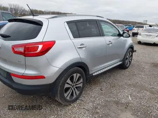 2013 Kia Sportage EX with VIN KNDPCCA22D7484936, listed as a IAAI auction lot 41921531 with 128,001 mi miles and . Bid and sale history available at DreamBid. Image 4.