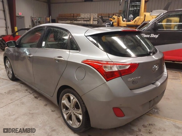2013 Hyundai Elantra GT with VIN KMHD35LE7DU044309, listed as a IAAI auction lot 41988026 with 128,636 mi miles. Bid and sale history available at carsss.com. Image 3.
