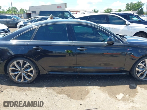 2014 Audi A6 Prestige with VIN WAUHGAFC9EN027338, listed as a IAAI auction lot 42377190 with 164,427 mi miles and . Bid and sale history available at DreamBid. Image 13.