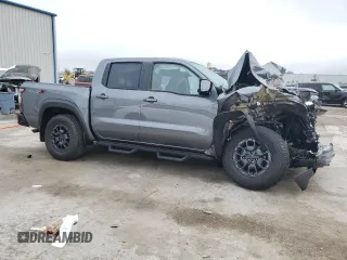 2024 Nissan Frontier Pro-X z VIN 1N6ED1EJ2RN605409, wystawiony jako Copart lot #85559674 z przebiegiem 6 850 mil mil oraz Nie do naprawy • Non repairable. Historia ofert i sprzedaży dostępna na DreamBid. Obrazek 4.