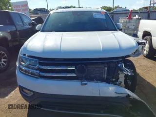 2018 Volkswagen Atlas SEL z VIN 1V2MR2CA3JC536009, wystawiony jako IAAI lot #40205798 z przebiegiem 125 945 mil mil oraz . Historia ofert i sprzedaży dostępna na DreamBid. Obrazek 13.