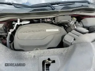 2019 Honda Passport Touring z VIN 5FNYF8H97KB016820, wystawiony jako Copart lot #61562855 z przebiegiem 41 772 mil mil oraz Szkoda całkowita • Salvage title. Historia ofert i sprzedaży dostępna na DreamBid. Obrazek 14.