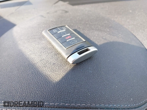 2012 Cadillac CTS Performance with VIN 1G6DJ1E35C0110444, listed as a IAAI auction lot 41412340 with 160,275 mi miles and . Bid and sale history available at DreamBid. Image 11.