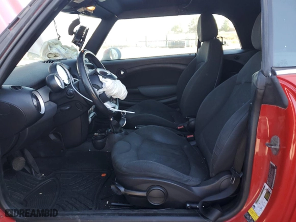 2009 MINI Cooper Convertible with VIN WMWMR33579TU96438, listed as a Copart auction lot 73787644 with 124,408 mi miles and Salvage Title. Bid and sale history available at carsss.com. Image 7.