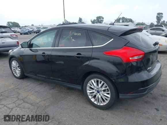 2017 Ford Focus Titanium with VIN 1FADP3N2XHL230766, listed as a IAAI auction lot 42386275 with 64,138 mi miles and . Bid and sale history available at DreamBid. Image 3.