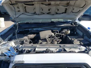 2016 Toyota Tacoma SR with VIN 5TFRX5GNXGX068468, listed as a IAAI auction lot 41844337 with 284,068 mi miles and . Bid and sale history available at carsss.com. Image 10.