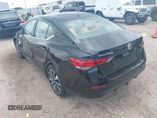 2022 Nissan Sentra SV z VIN 3N1AB8CV9NY313875, wystawiony jako IAAI lot #42117439 z przebiegiem 13 696 mil mil oraz . Historia ofert i sprzedaży dostępna na DreamBid. Obrazek 3.