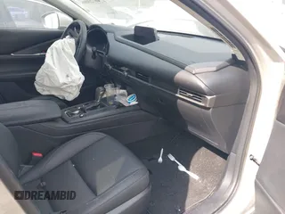 2023 Mazda CX-30 S Select with VIN 3MVDMBBM6PM518380, listed as a IAAI auction lot 40720006 with 13,422 mi miles and . Bid and sale history available at DreamBid. Image 5.