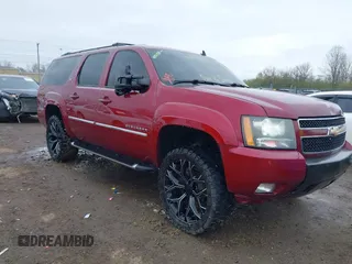 2010 Chevrolet Suburban LT with VIN 1GNUKJE38AR274572, listed as a IAAI auction lot 42022321 with 260,690 mi miles. Bid and sale history available at carsss.com. Image 1.