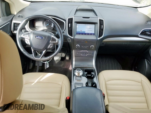 2020 Ford Edge SEL с VIN 2FMPK3J93LBB16928, выставлен на аукционе Copart как лот 63030385 с пробегом 81 567 миль миль и Чистый • Clean title. История ставок и продаж доступна на DreamBid. Изображение 8.