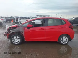 2016 Honda Fit LX z VIN JHMGK5H58GS011783, wystawiony jako IAAI lot #42194425 z przebiegiem Nie podano mil oraz . Historia ofert i sprzedaży dostępna na DreamBid. Obrazek 14.