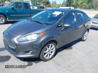 2019 Ford Fiesta SE z VIN 3FADP4BJ2KM131012, wystawiony jako IAAI lot #42228822 z przebiegiem 100 460 mil mil oraz . Historia ofert i sprzedaży dostępna na DreamBid. Obrazek 17.