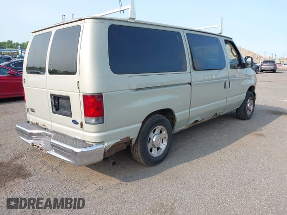 2005 Ford Econoline Passenger XL with VIN 1FMRE11W15HA64778, listed as a IAAI auction lot 42397426 with 330,632 mi miles and . Bid and sale history available at DreamBid. Image 4.