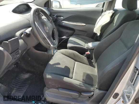 2009 Toyota Yaris with VIN JTDBT903391300394, listed as a Copart auction lot 53392945 with 227,210 mi miles and Salvage Title. Bid and sale history available at DreamBid. Image 7.
