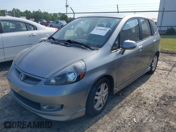 2008 Honda Fit Sport with VIN JHMGD386X8S058659, listed as a IAAI auction lot 42168584 with 210,589 mi miles. Bid and sale history available at carsss.com. Image 2.