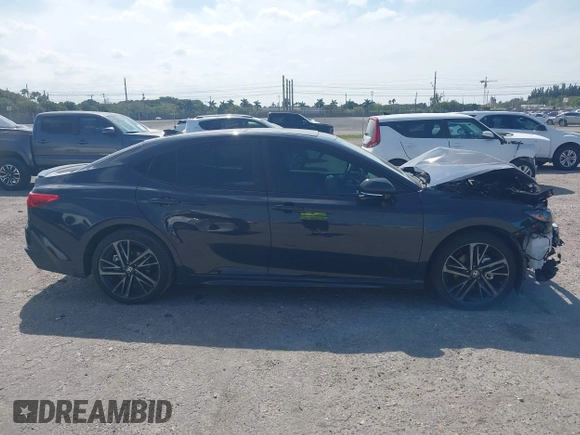 2025 Toyota Camry LE with VIN 4T1DAACK5SU076886, listed as a IAAI auction lot 41629641 with 9,919 mi miles and . Bid and sale history available at DreamBid. Image 14.