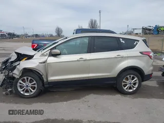 2017 Ford Escape SE with VIN 1FMCU9GD1HUB28732, listed as a IAAI auction lot 41546177 with 126,698 mi miles and . Bid and sale history available at DreamBid. Image 14.
