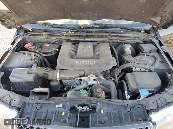 2007 Suzuki Grand Vitara with VIN JS3TE941474202110, listed as a Copart auction lot 77774424 with 131,717 mi miles and Salvage title. Bid and sale history available at DreamBid. Image 13.