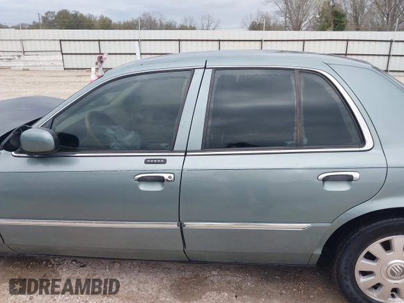 2005 Mercury Grand Marquis LS Premium z VIN 2MEHM75W45X662040, wystawiony jako IAAI lot #41697234 z przebiegiem 214 410 mil mil oraz . Historia ofert i sprzedaży dostępna na DreamBid. Obrazek 15.