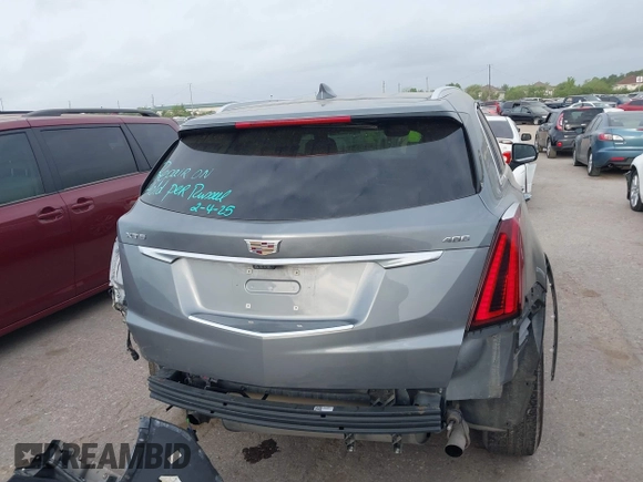 2021 Cadillac XT5 FWD Premium Luxury with VIN 1GYKNCRS5MZ128908, listed as a IAAI auction lot 41919571 with 51,280 mi miles and . Bid and sale history available at carsss.com. Image 17.