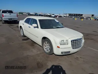 2007 Chrysler 300 Limited with VIN 2C3KA53G57H898956, listed as a IAAI auction lot 40625095 with 216,002 mi miles. Bid and sale history available at carsss.com. Image 1.