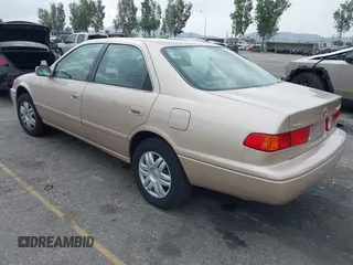2001 Toyota Camry CE with VIN 4T1BG22K81U075758, listed as a IAAI auction lot 42024950 with 107,439 mi miles. Bid and sale history available at carsss.com. Image 3.