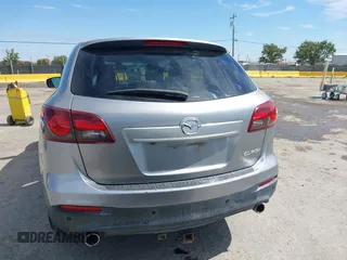 2014 Mazda CX-9 Grand Touring z VIN JM3TB2DVXE0432991, wystawiony jako IAAI lot #42826784 z przebiegiem 134 265 mil mil oraz . Historia ofert i sprzedaży dostępna na DreamBid. Obrazek 16.