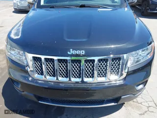 2012 Jeep Grand Cherokee Overland with VIN 1C4RJFCT7CC185602, listed as a IAAI auction lot 42018715 with 91,507 mi miles. Bid and sale history available at carsss.com. Image 6.