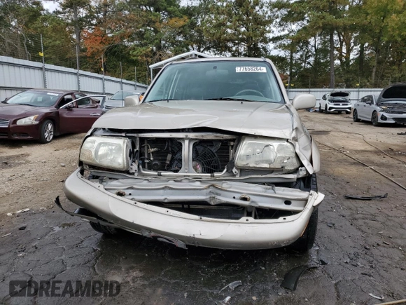 2002 Suzuki XL7 Standard z VIN JS3TY92V524101048, wystawiony jako Copart lot #77658264 z przebiegiem 226 279 mil mil oraz Szkoda całkowita • Salvage title. Historia ofert i sprzedaży dostępna na DreamBid. Obrazek 5.