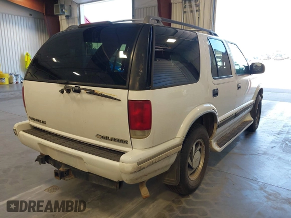 1995 Chevrolet Blazer with VIN 1GNDT13W0S2182537, listed as a IAAI auction lot 42647704 with 288,515 mi miles and . Bid and sale history available at DreamBid. Image 4.