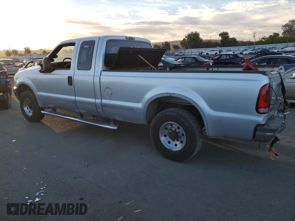 1999 Ford Super Duty F-250 XL with VIN 1FTNX20F3XED60894, listed as a Copart auction lot 74849284 with 148,779 mi miles and Salvage Title. Bid and sale history available at carsss.com. Image 2.