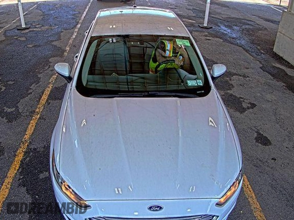 2015 Ford Fusion S with VIN 1FA6P0G7XF5127770, listed as a IAAI auction lot 42845978 with 150,942 mi miles and . Bid and sale history available at DreamBid. Image 16.
