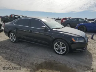 2014 Volkswagen Passat TDI SE w/Sunroof with VIN 1VWBN7A33EC033475, listed as a Copart auction lot 47461305 with 188,885 mi miles and Salvage Title. Bid and sale history available at carsss.com. Image 4.
