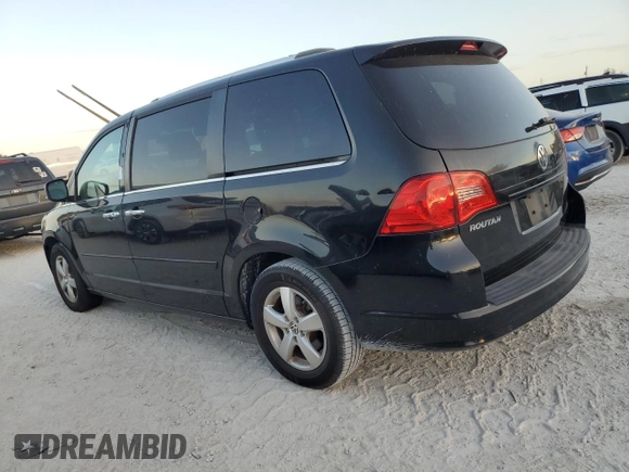 2013 Volkswagen Routan z VIN 2C4RVADG8DR725749, wystawiony jako Copart lot #77624324 z przebiegiem 156 557 mil mil oraz Czysty tytuł • Clean title. Historia ofert i sprzedaży dostępna na DreamBid. Obrazek 2.